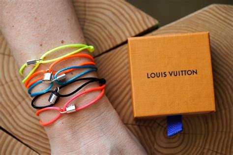 louis vuitton e unicef|louis vuitton unicef bracelet used.